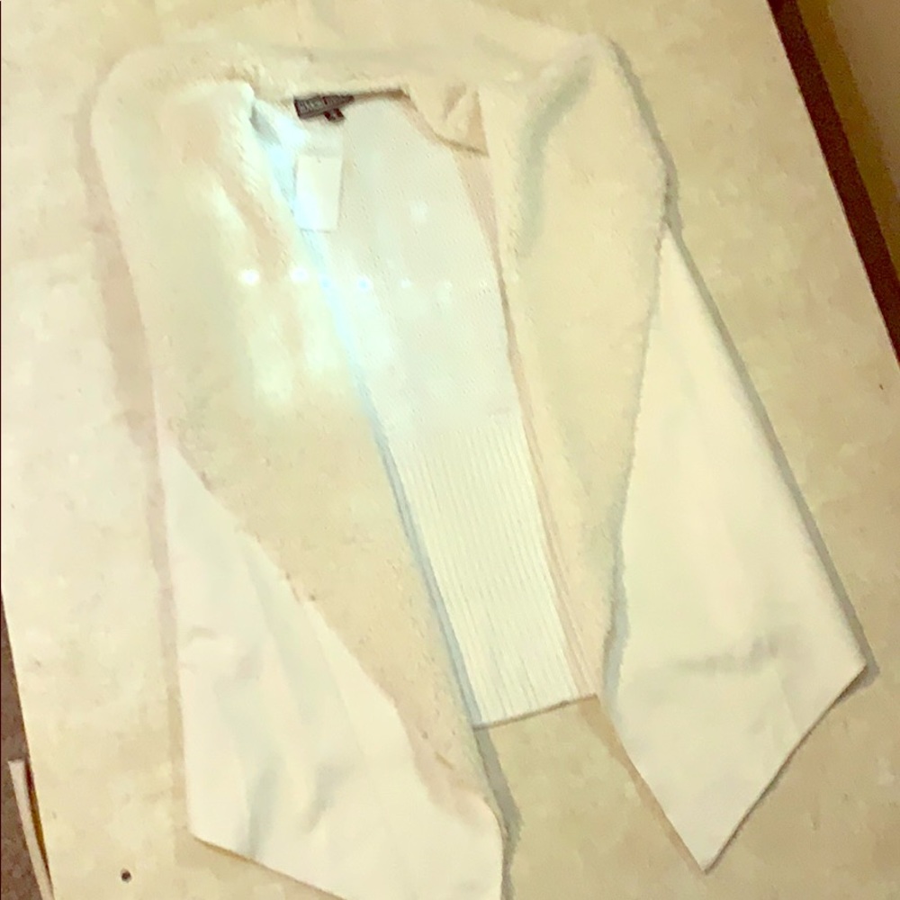 Cream colored vest